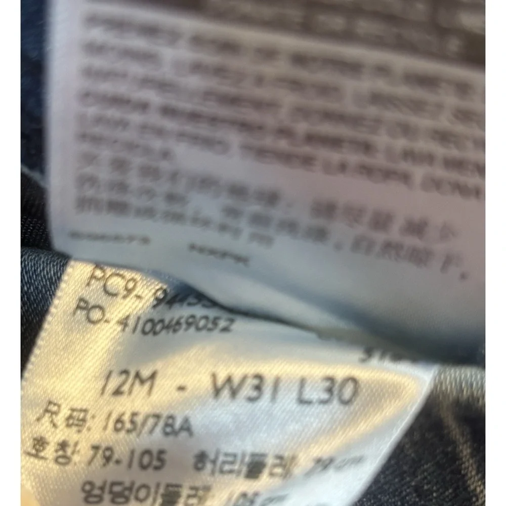 Signature by Levi Strauss tag shows
